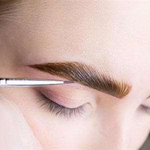 Eyebrow tinting and shaping treatment